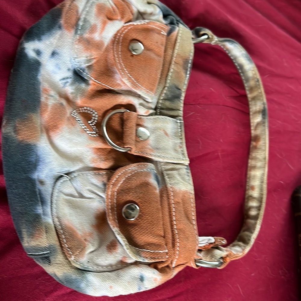 Tie dye fun 100%cotton, 2 front small pockets snaps. Like new